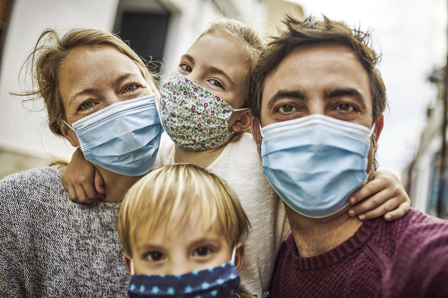 Family wearing a mask